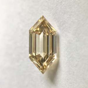 Elongated Hexagon shape Light Brown color step cut diamond