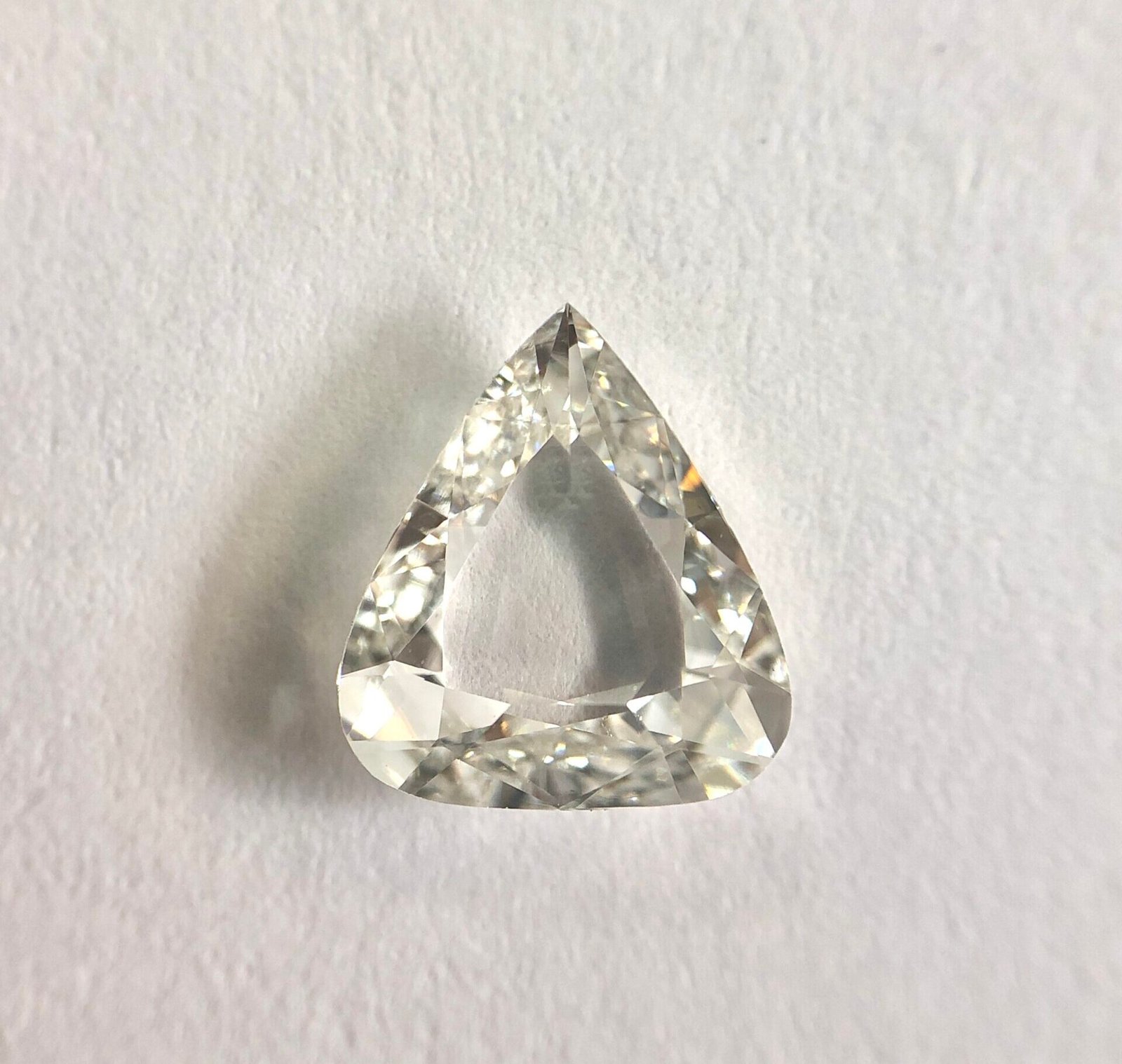 Pear shape H color old mine cut diamond