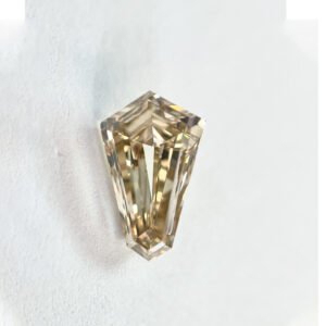 Kite shape Light Brown color Step cut  diamond