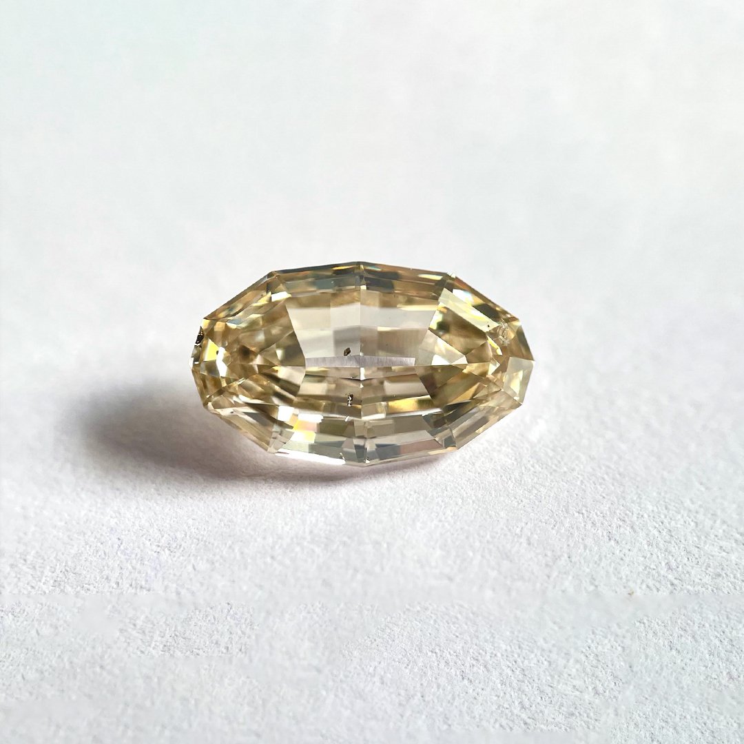 Oval shape Brown colour Step cut diamond