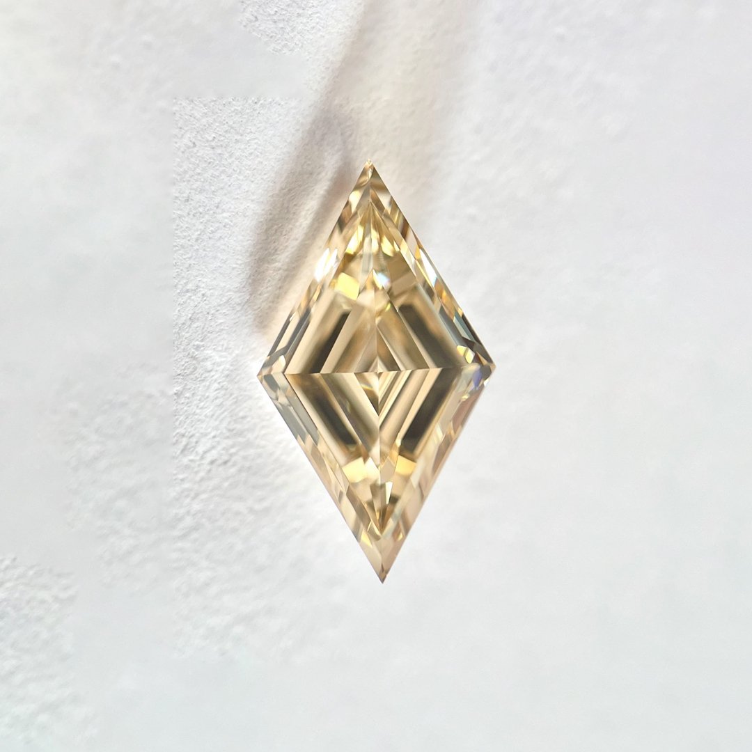 Lozenge shape Brown color Step cut diamond