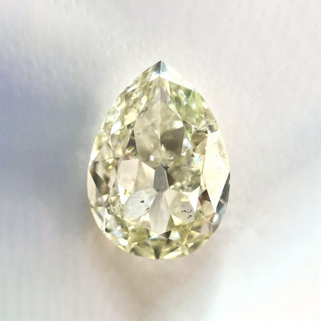 Pear shape L color old mine cut diamond